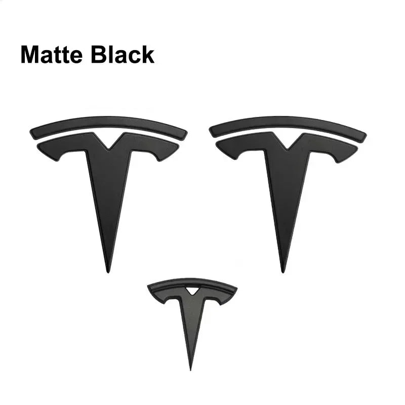 סט מדבקות סמל שחורות לטסלה – קדמי, אחורי, תא מטען והגה | מתאים לדגמי Model 3 / Y